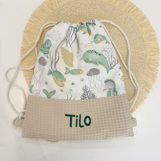 Mochila saco infantil con cuerdas de tela ocean mint y gofre beige