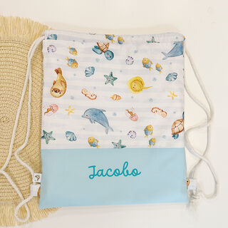 Mochila saco infantil con cuerdas de tela peces y rayas y verde agua