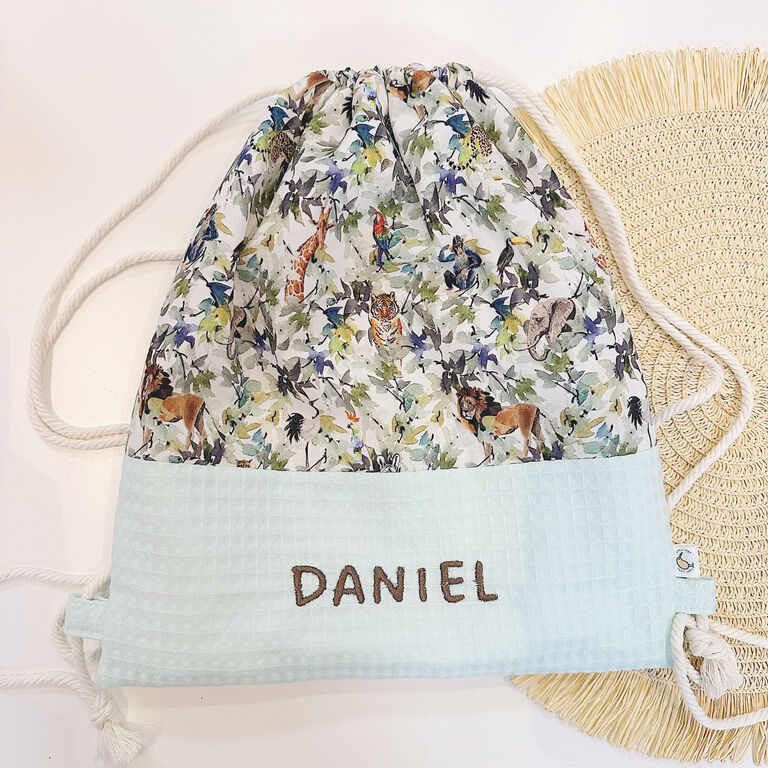 Mochila saco infantil con cuerdas de tela la selva y gofre mint