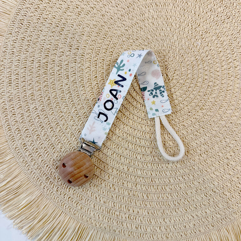 Chupetero de tela bajo el mar